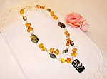1a_barnstens-halsband_halvadelsten.jpg